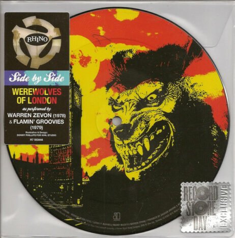 The image features a vivid, comic-style illustration of a snarling werewolf with a menacing grin. The background is dominated by bright red and yellow hues, creating a dramatic, fiery atmosphere. On the left side of the image, part of a dark silhouette resembling London's Big Ben can be seen. The top left corner displays a label with the text "RHINO" and "Side by Side." Below this, the text reads "WEREWOLVES OF LONDON as performed by WARREN ZEVON (1978) & FLAMIN' GROOVIES (1979)." In the bottom right corner, a "Record Store Day Exclusive" stamp is visible, indicating its special edition status.