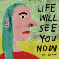 The image shows a painting of a person with long green hair and a prominent nose, holding a cigarette in their mouth. The text of the title is written to the right of the figure in large black letters. The artists name is beneath it, in smaller text.