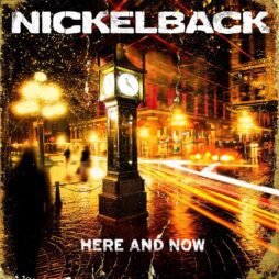 This is the album cover for Nickelback - Here And Now. It features a city centre at night illuminated by lights.