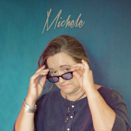 This is the album cover for "Michele" by Thor Rixon. The artwork features a person adjusting their glasses. The background is a solid teal color, and the name "Michele" is written elegantly at the top in a cursive style.
