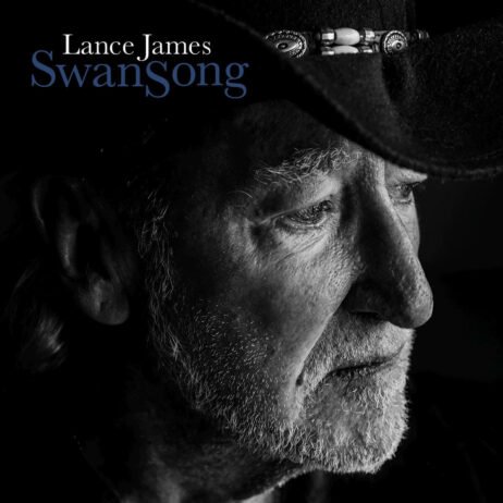 The ioomage is of the Lance James album Swan song. It is a black cover with a black and white photograph of Lance James. The artist's name is located in the top left corner in grey, below this is the title in blue.