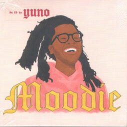 The image is of the cover for Yuno's EP "Moodie." The artwork features a colorful illustration of Yuno smiling broadly, wearing glasses, and sporting long dreadlocks. He is dressed in a pink hoodie, and the background is a soft, pastel tone. The artist's name, "Yuno," is written at the top left in a casual, handwritten style. The title, "Moodie," is written in a bold, yellow gothic font at the bottom, creating a contrast between the playful illustration and the traditional typeface.