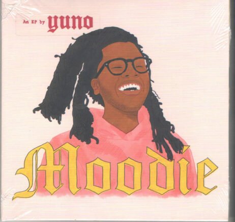 The image is of the cover for Yuno's EP "Moodie." The artwork features a colorful illustration of Yuno smiling broadly, wearing glasses, and sporting long dreadlocks. He is dressed in a pink hoodie, and the background is a soft, pastel tone. The artist's name, "Yuno," is written at the top left in a casual, handwritten style. The title, "Moodie," is written in a bold, yellow gothic font at the bottom, creating a contrast between the playful illustration and the traditional typeface.