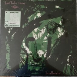 The image is the album cover for Buffalo Tom - Birdbrain. The cover features an abstract, painterly artwork in shades of green and black, in a somewhat chaotic and dynamic way. The imagery suggests natural elements like trees or brushstrokes The band's name, "Buffalo Tom," is placed at the top, and the album title, "Birdbrain," is at the bottom, both in simple white text that contrasts with the dark background. A sticker on the album cover notes the "30th Anniversary" of the album, indicating a special reissue edition.