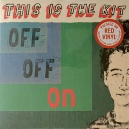 The image is the album cover for This Is The Kit - Off Off On. The artwork features a collage-style design with the words "Off Off" written twice in a blocky, stamped font on a blue and green background, while the word "on" is written in red below. At the top, the band name, This Is The Kit, is presented in a bold, hand-drawn style, and a sticker indicates that this edition is pressed on red vinyl. On the right side of the cover, there is a stylized illustration of a person's face.