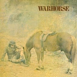 The image shows a vintage or faded scene where a soldier sits on the ground, dressed in a uniform and helmet, resting beside a brown horse that is standing with a saddle on its back. The horse appears calm and is lowering its head to the ground as if grazing or resting. The scene has a worn or sepia tone. Above the scene, the word "WARHORSE" is prominently displayed in large capital letters.
