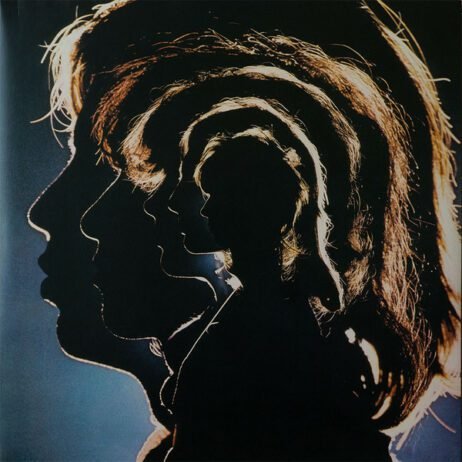 The album cover features a series of nested silhouettes of a man's profile, creating a layered effect. Each profile is progressively smaller and seems to depict the same face at different stages, resembling a psychedelic visual. The image is predominantly dark with highlights around the edges of the hair, giving it a glowing effect. The background is black, enhancing the luminous outlines of the profiles.