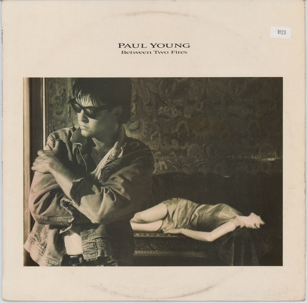 Paul Young - Between Two Fires (VG+/VG)